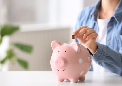 This photo answers the question: "How easy is it to pay my Storage King account?" The simple act of placing a coin in a piggy bank symbolises our straightforward payment process. We believe managing your storage billing should be just as easy. This represents our secure and simple payment portal, where you can manage your account in just a few clicks.